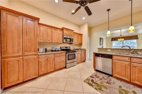 Kitchen - 108 Cardinal Rd, Sebring, FL 33876 photo 3 of 5