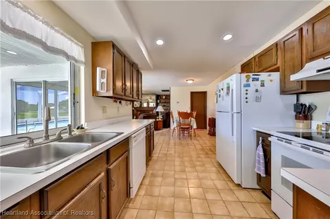 Kitchen - 7700 Granada Rd, Sebring, FL 33876 photo 2 of 2