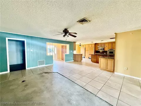 Living - 740 Killarney Dr, Sebring, FL 33870 photo 4 of 6