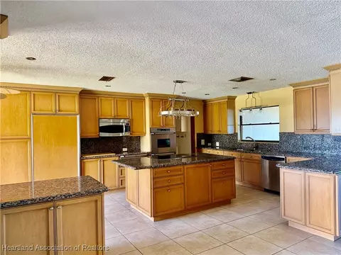 Kitchen - 740 Killarney Dr, Sebring, FL 33870 photo 1 of 4