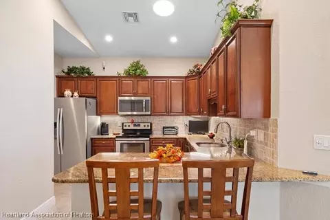 Kitchen - 1624 Marble St, Sebring, FL 33870 photo 2 of 4