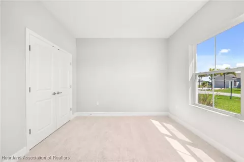 Bedroom - 5289 Pebble Beach Dr, Sebring, FL 33872 photo 12 of 13