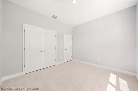 Bedroom - 5289 Pebble Beach Dr, Sebring, FL 33872 photo 4 of 13