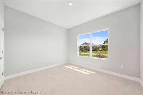 Bedroom - 5289 Pebble Beach Dr, Sebring, FL 33872 photo 13 of 13
