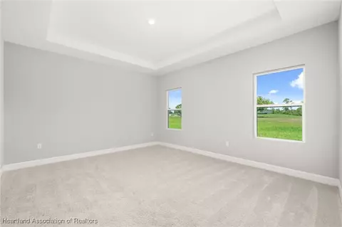 Bedroom - 5289 Pebble Beach Dr, Sebring, FL 33872 photo 3 of 13