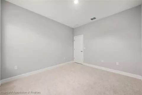 Bedroom - 5289 Pebble Beach Dr, Sebring, FL 33872 photo 8 of 13