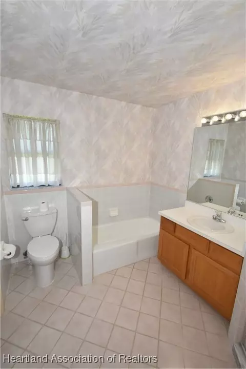 Bath - 2936 Sugar Pine Cir, Sebring, FL 33872 photo 2 of 4