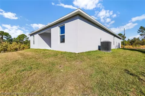 Exterior - 8035 Yumuri St, Sebring, FL 33872 photo 6 of 8