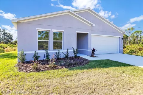 Exterior - 8035 Yumuri St, Sebring, FL 33872 photo 3 of 8
