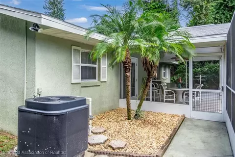 Exterior - 5801 Twisted Oaks Dr, Sebring, FL 33876 photo 12 of 19