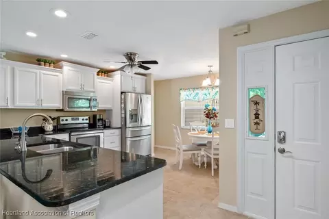 Kitchen - 5801 Twisted Oaks Dr, Sebring, FL 33876 photo 2 of 4