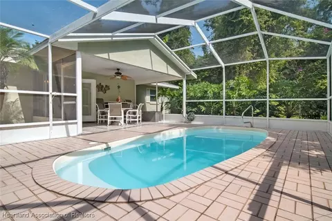 Exterior - 5801 Twisted Oaks Dr, Sebring, FL 33876 photo 7 of 19