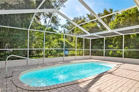 Exterior - 5801 Twisted Oaks Dr, Sebring, FL 33876 photo 4 of 19