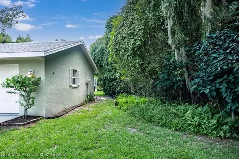 Exterior - 5801 Twisted Oaks Dr, Sebring, FL 33876 photo 9 of 19