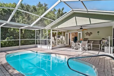 Exterior - 5801 Twisted Oaks Dr, Sebring, FL 33876 photo 5 of 19