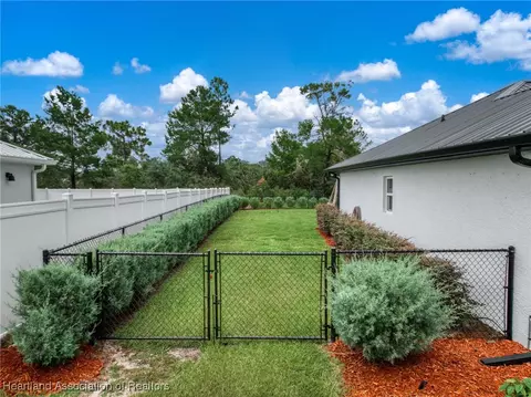 Exterior - 6829 San Bruno Dr, Sebring, FL 33872 photo 7 of 13