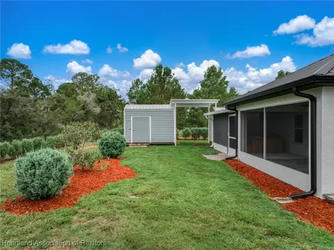 Exterior - 6829 San Bruno Dr, Sebring, FL 33872 photo 9 of 13