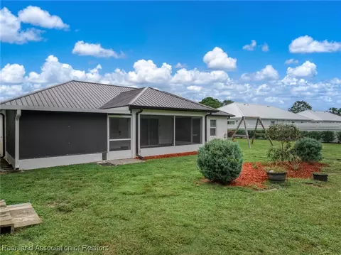 Exterior - 6829 San Bruno Dr, Sebring, FL 33872 photo 11 of 13