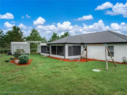 Exterior - 6829 San Bruno Dr, Sebring, FL 33872 photo 8 of 13