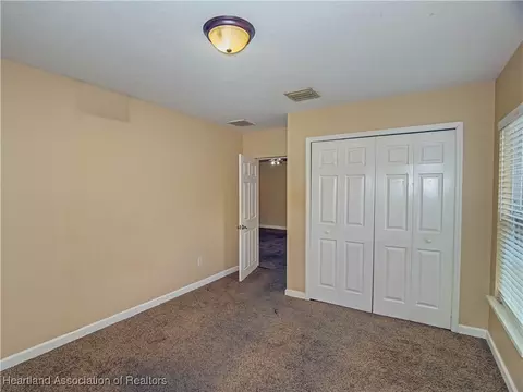 Bedroom - 4611 Granada Blvd, Sebring, FL 33872 photo 3 of 7