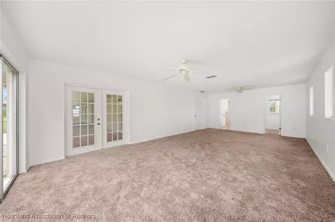 Living - 1708 Elf Dr, Sebring, FL 33875 photo 8 of 9