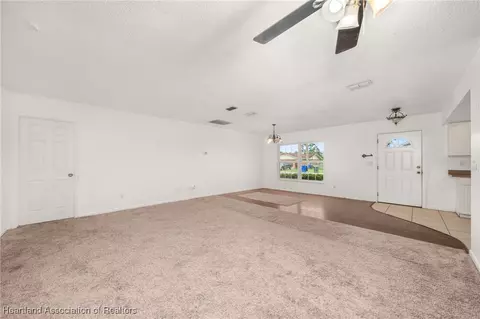 Living - 1708 Elf Dr, Sebring, FL 33875 photo 5 of 9