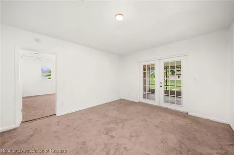 Living - 1708 Elf Dr, Sebring, FL 33875 photo 6 of 9