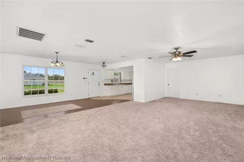 Living - 1708 Elf Dr, Sebring, FL 33875 photo 3 of 9