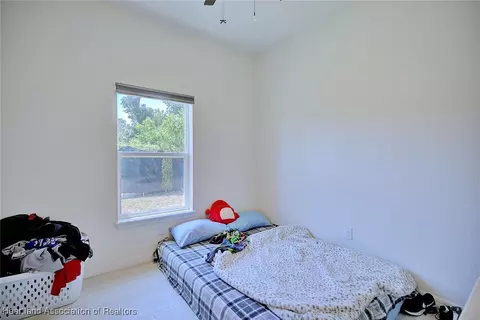 Bedroom - 1301 Ebro Ct, Sebring, FL 33870 photo 5 of 5