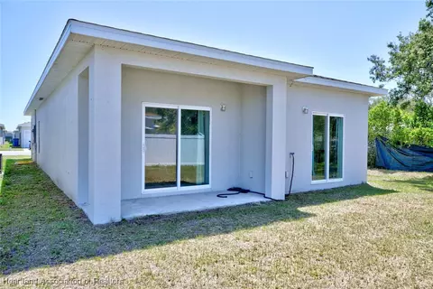 Exterior - 1301 Ebro Ct, Sebring, FL 33870 photo 3 of 4