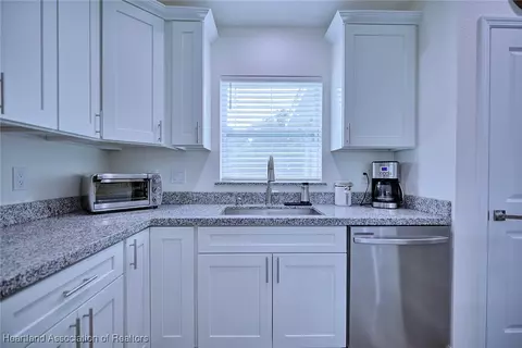 Kitchen - 224 Robinhood Ter, Sebring, FL 33876 photo 2 of 4