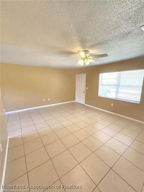 Living - 1012 Triumph Dr, Sebring, FL 33872 photo 3 of 5