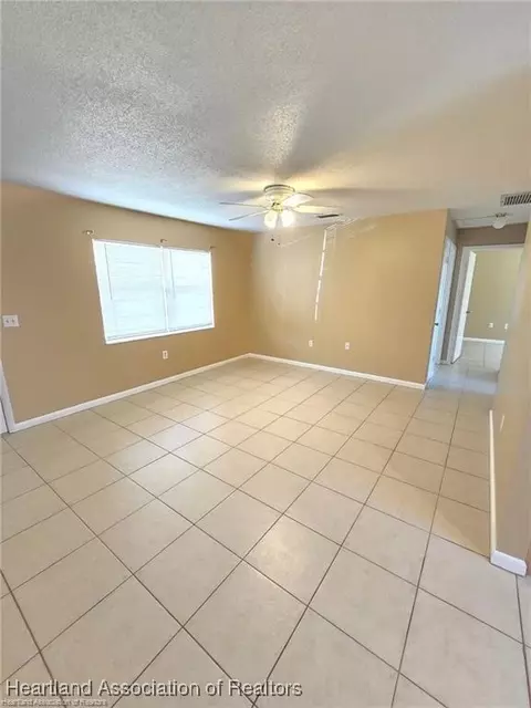 Living - 1012 Triumph Dr, Sebring, FL 33872 photo 1 of 5