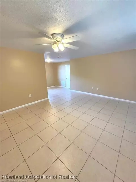Living - 1012 Triumph Dr, Sebring, FL 33872 photo 2 of 5