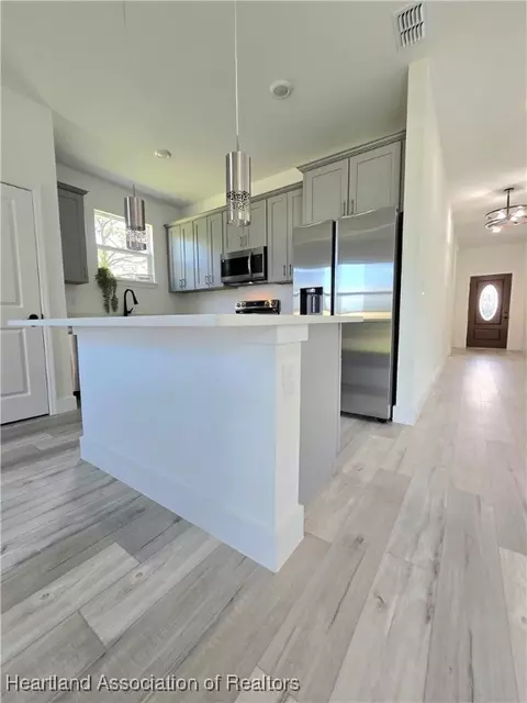 Kitchen - 5833 Longbow Dr, Sebring, FL 33876 photo 5 of 5