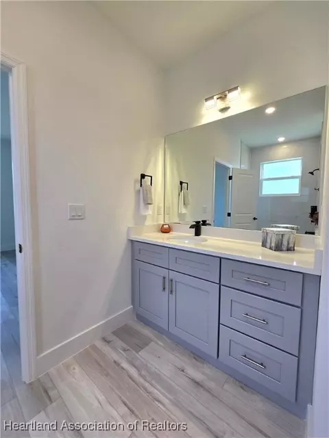 Bath - 5833 Longbow Dr, Sebring, FL 33876 photo 4 of 8