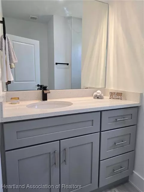 Bath - 5833 Longbow Dr, Sebring, FL 33876 photo 3 of 8