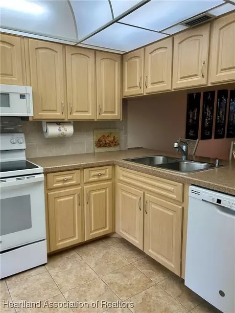 Kitchen - 3841 Edgewater Dr, Sebring, FL 33872 photo 2 of 2