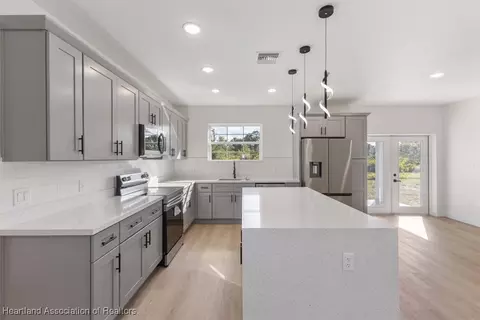 Kitchen - 7335 Ancha St, Sebring, FL 33872 photo 2 of 6