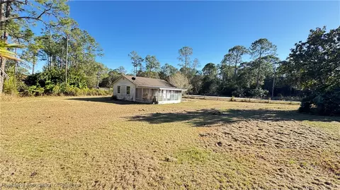 Exterior - 5920 Cherry Rd, Sebring, FL 33875 photo 6 of 16