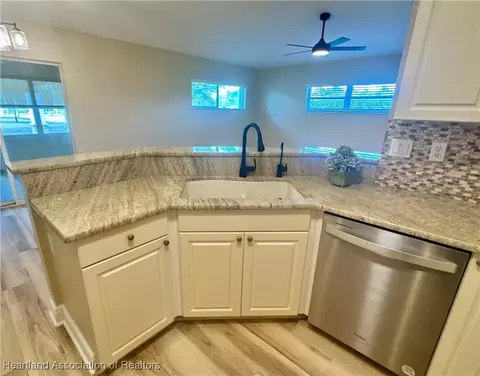 Kitchen - 1643 Willow Run, Sebring, FL 33872 photo 2 of 2