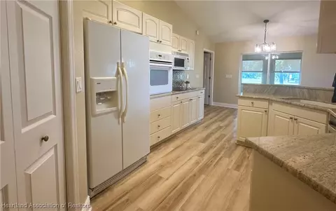 Kitchen - 1643 Willow Run, Sebring, FL 33872 photo 1 of 2