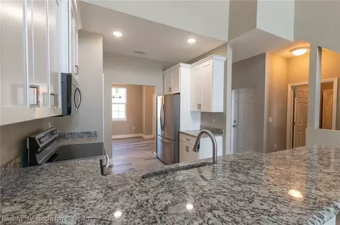Kitchen - 1942 Oasis Court 1942, Sebring, FL 33870 photo 4 of 5