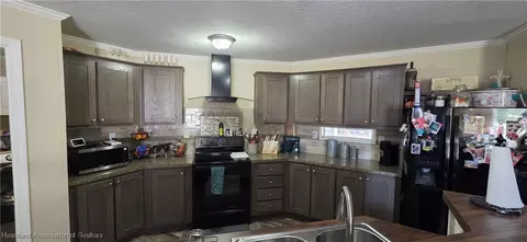 Kitchen - 5679 NW 20 St, Okeechobee, FL 34972 photo 1 of 1