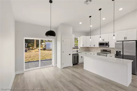 Kitchen - 3825 Citroen Dr, Sebring, FL 33872 photo 2 of 3