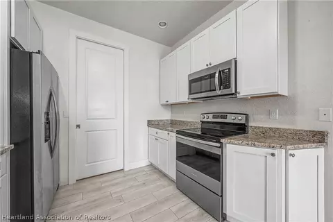 Kitchen - 5731 Granada Blvd, Sebring, FL 33872 photo 2 of 5