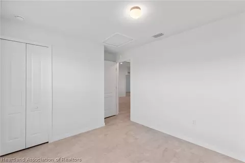 Bedroom - 6151 Monegro St, Sebring, FL 33872 photo 5 of 7