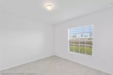 Bedroom - 6151 Monegro St, Sebring, FL 33872 photo 4 of 7