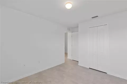 Bedroom - 6151 Monegro St, Sebring, FL 33872 photo 7 of 7