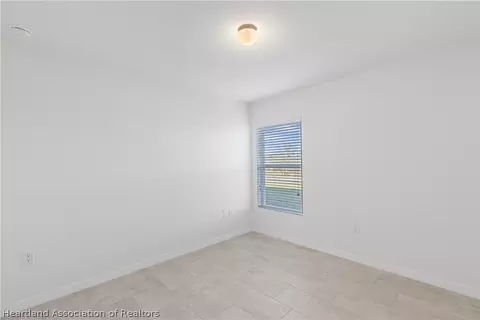 Bedroom - 6151 Monegro St, Sebring, FL 33872 photo 6 of 7